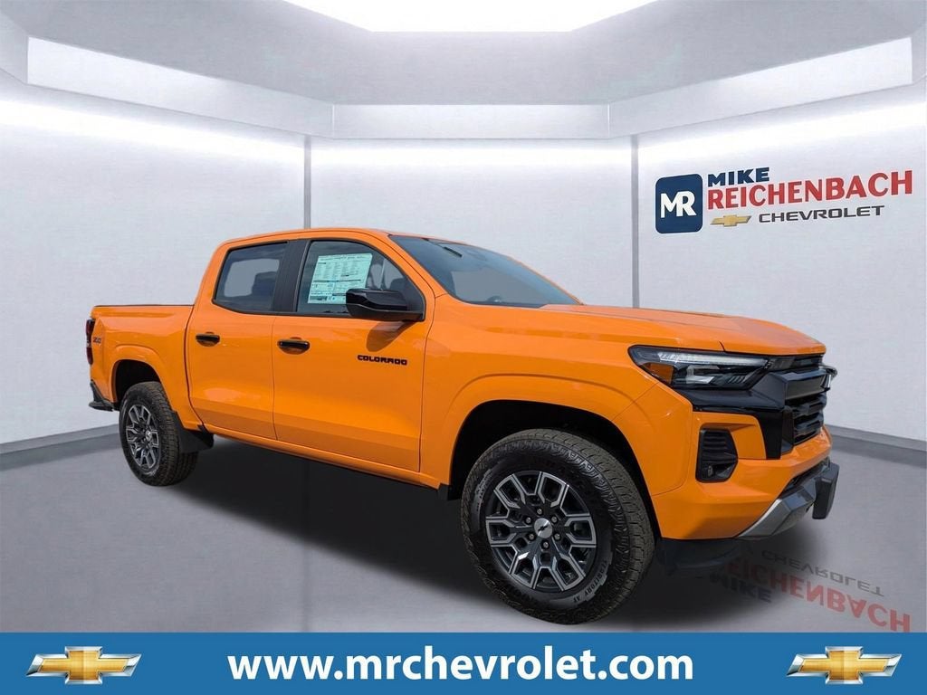 2026 Chevrolet Colorado Z71 in Sunrise Orange — front three-quarter view