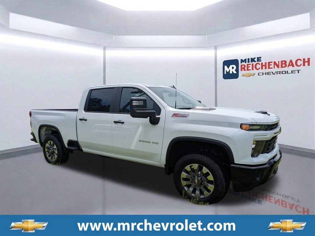 2026 Chevrolet Silverado 2500 HD Custom in Summit White — front three-quarter view