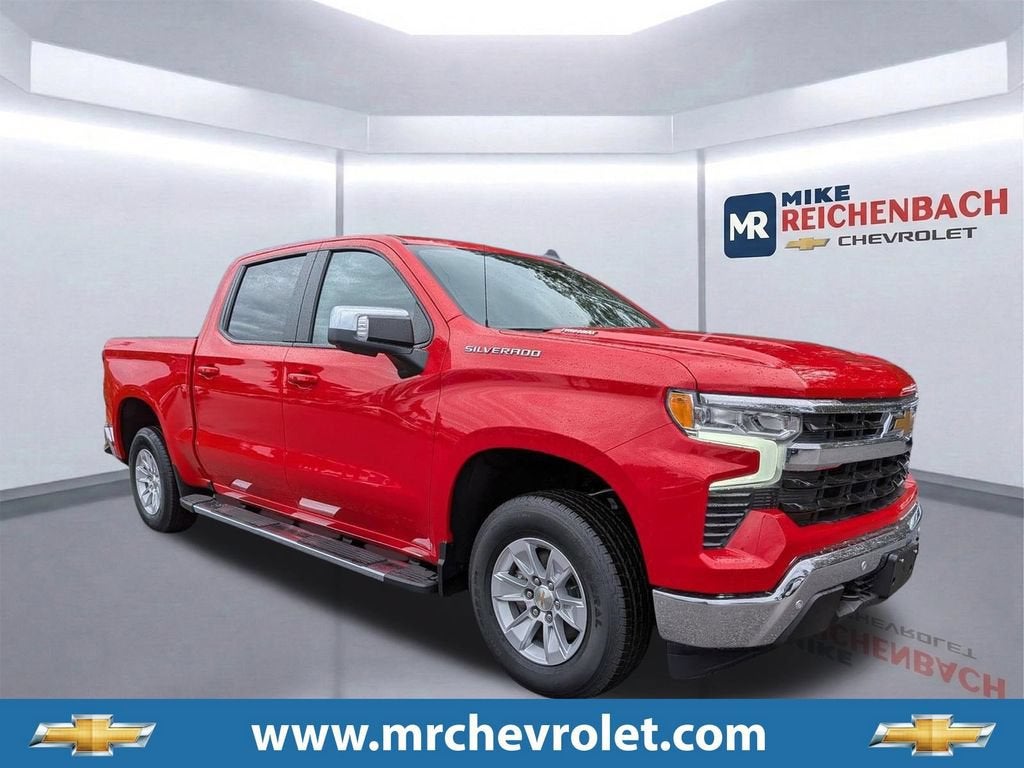 2026 Chevrolet Silverado 1500 LT in Red Hot — front three-quarter view